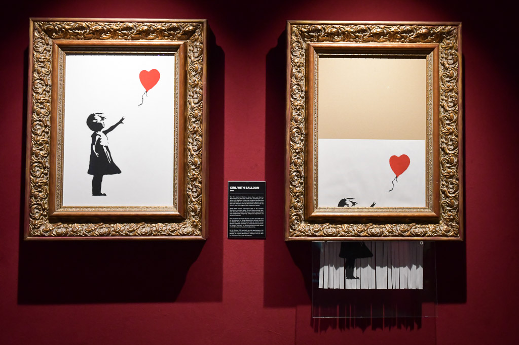 Zwei Rahmen mit Girl-with-Balloon-Motiv